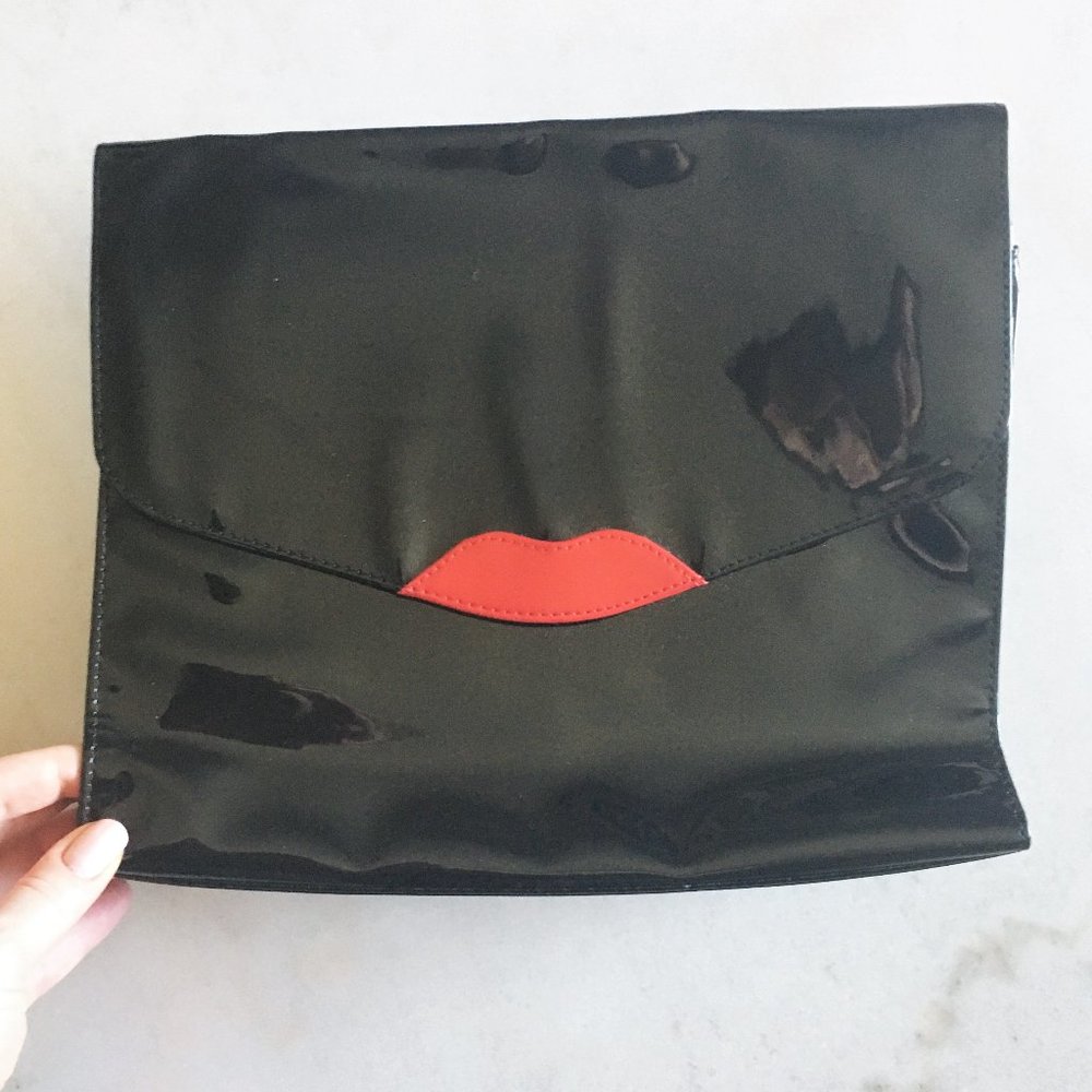 3/$36 - New! Shiny black envelope clutch (sealed with a kiss!) with red lips